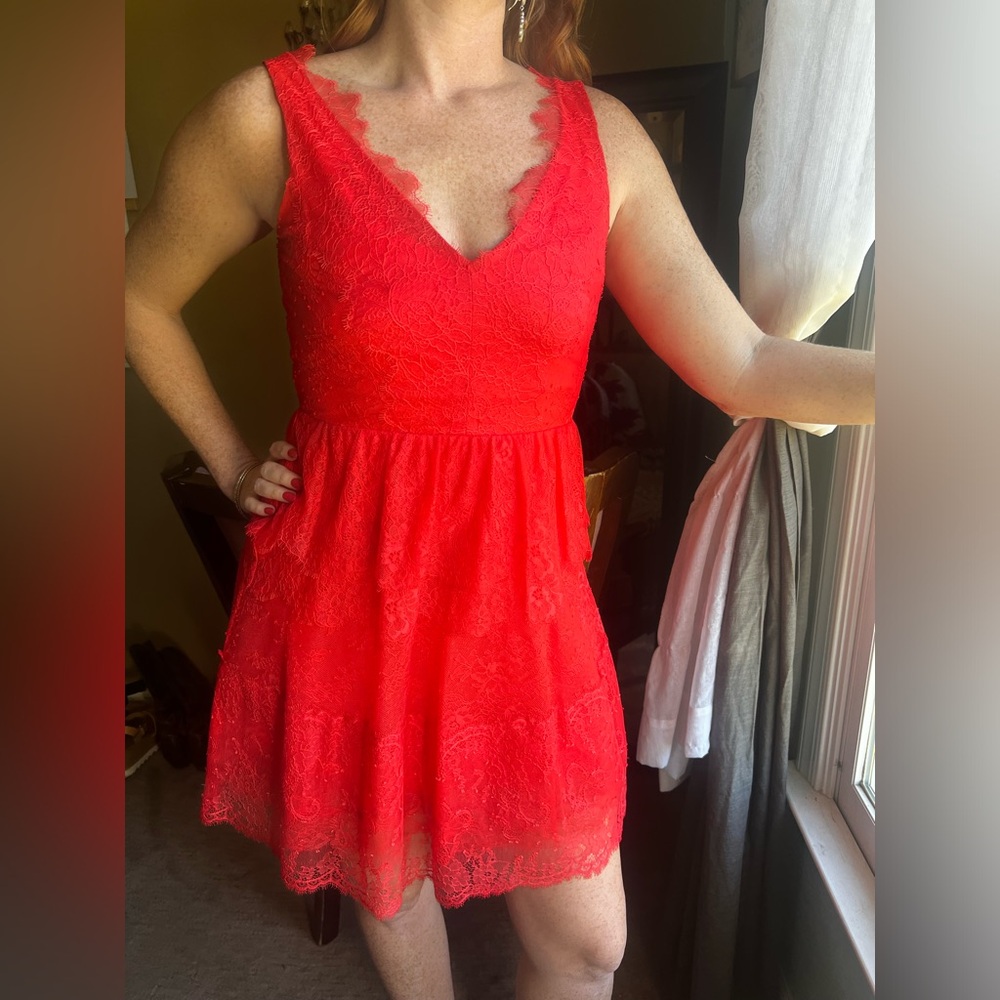 Beautiful salmon color lace dress from BCBG size Small